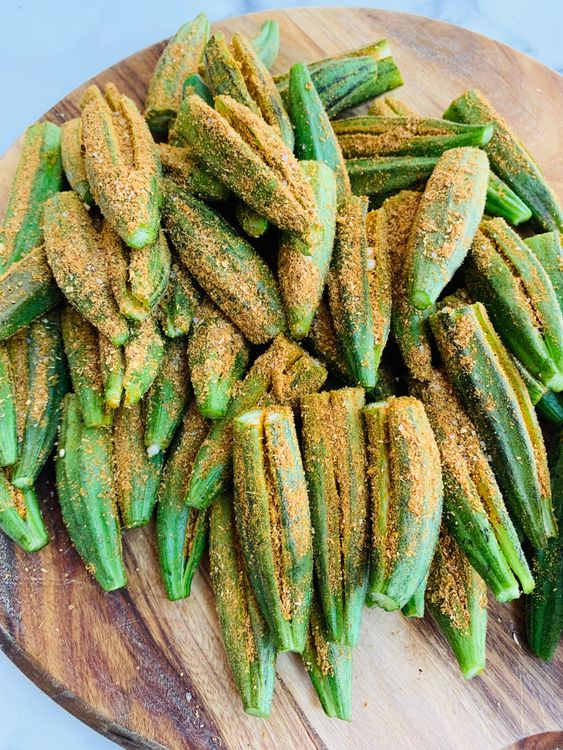 Step 3.2: Using a small spoon or your fingers, gently fill each bhindi with the prepared masala mix