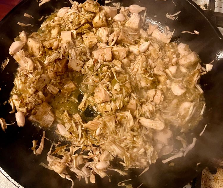 Step 1.1: Add 3/4 cup of the green sauce and mix in with the jackfruit
