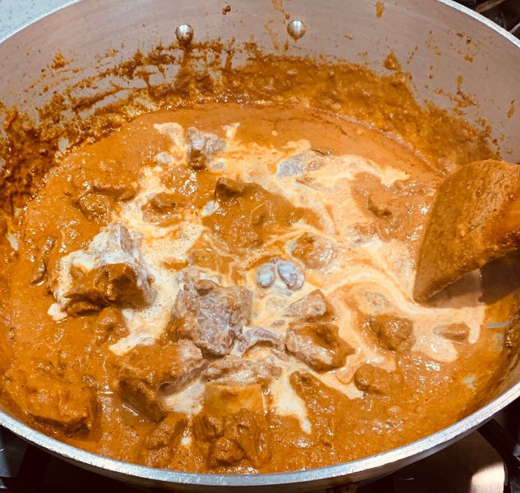 Step 3.1: Add Kewra essence and cashew paste and mix well