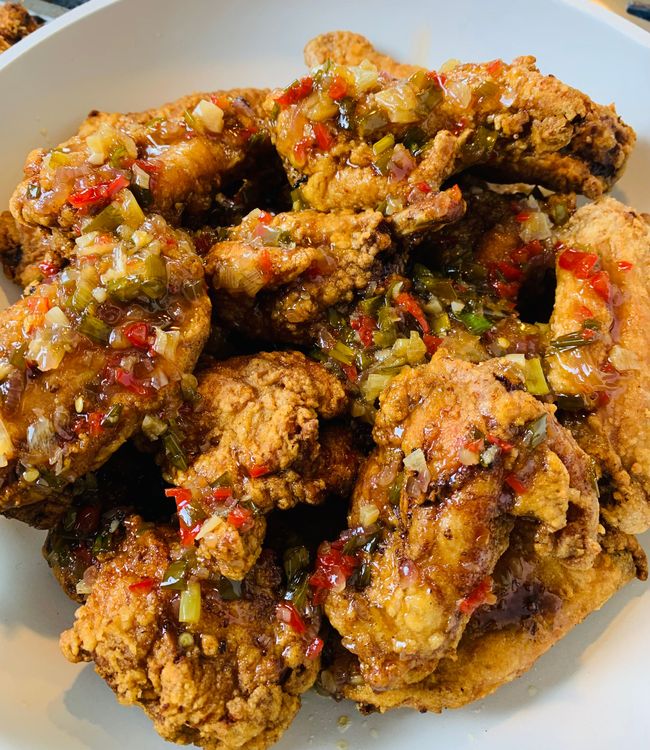 Step 4.1: Just before serving, toss hot wings in the sauce until evenly coated