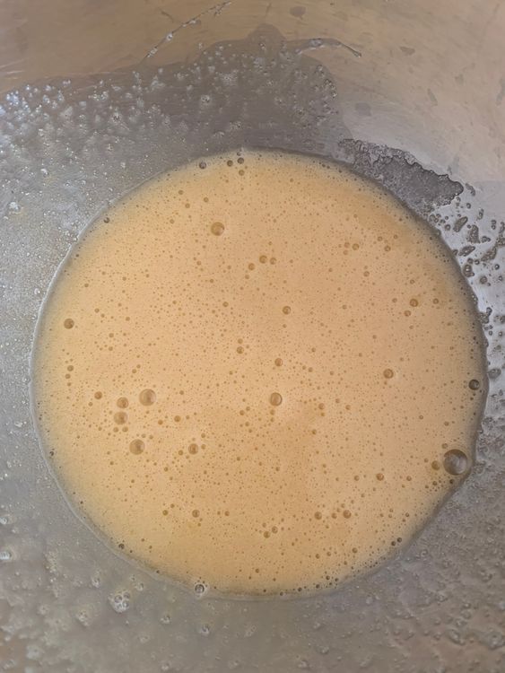 Step 1.2: In a large mixing bowl, whisk the egg and sugar together until the sugar dissolves