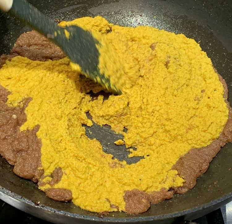 Step 3.1: Add the coconut curry paste to the skillet and mix well