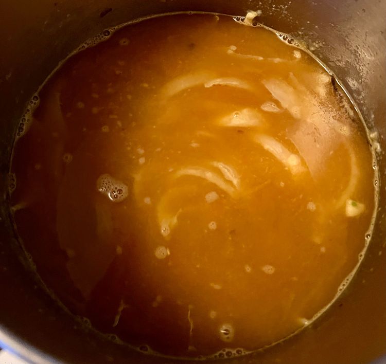 Step 2.2: Add the flour and stir immediately, just enough to mix in with the onion and garlic mixture