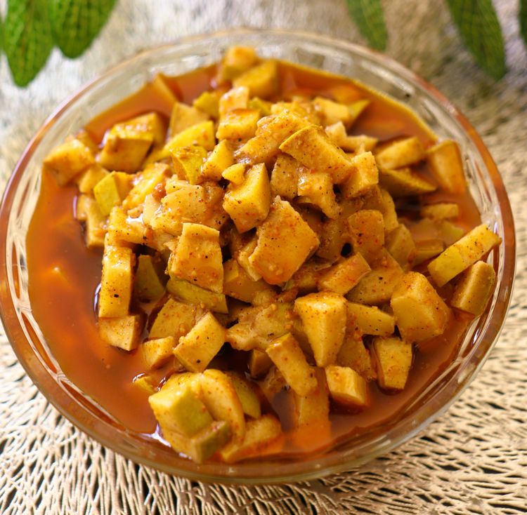 Step 6.1: Enjoy this tangy, spicy mango pickle with parathas or rotis, or alongside rice and dal