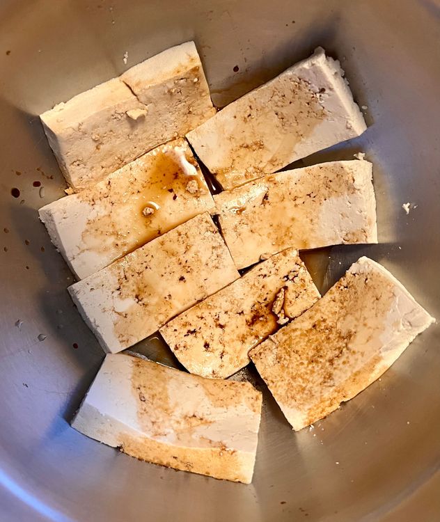 Step 1.1: Place the slabs of tofu in a bowl or shallow dish