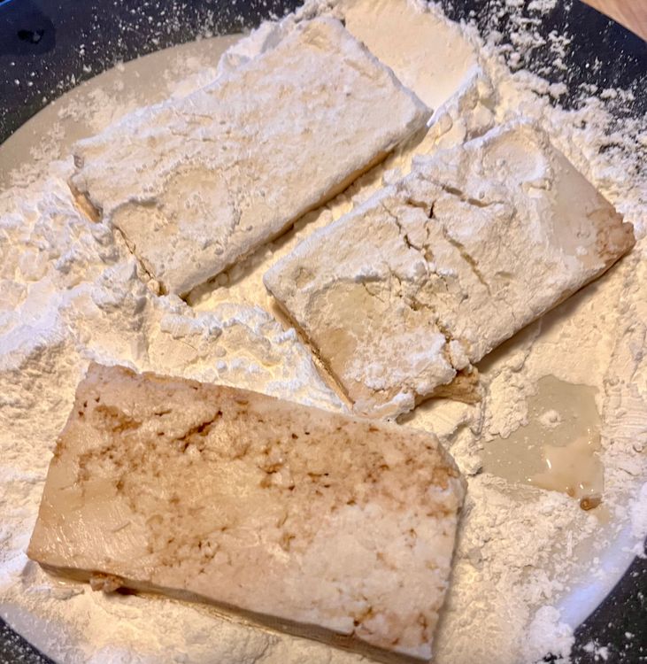 Step 1.1: Take the tofu out of the bowl and lightly dab with a paper towel