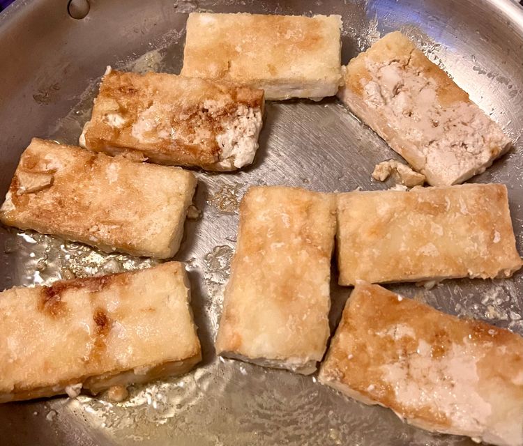 Step 1.2: Meanwhile, heat the vegetable oil in a large pan or wok over medium-high heat