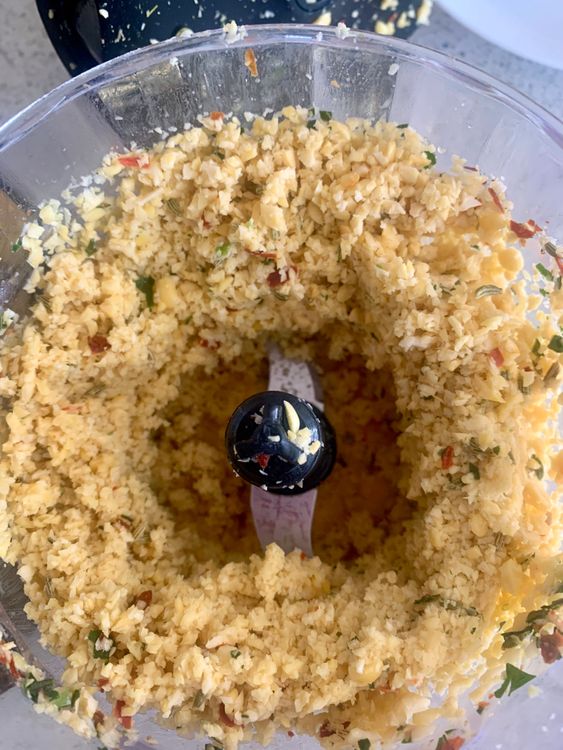 Step 1.1: Reserve a small portion of the soaked dal and combine the rest with the ground mixture in the grinder