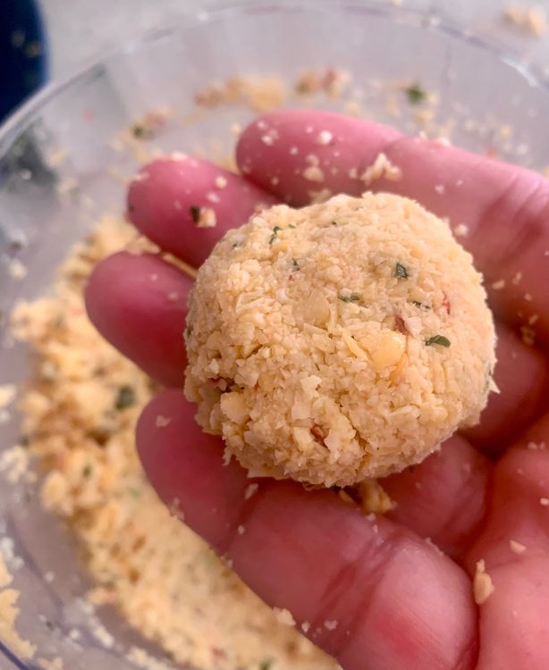 Step 1.2: Reserve a small portion of the soaked dal and combine the rest with the ground mixture in the grinder