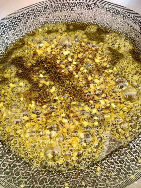 Step 2.1: Add ginger and garlic; sauté for 1–2 minutes until fragrant