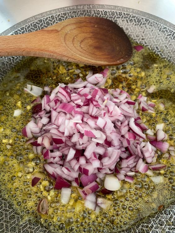 Step 2.1: Stir in the onions and cook until soft and lightly golden