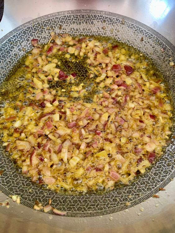 Step 2.2: Stir in the onions and cook until soft and lightly golden