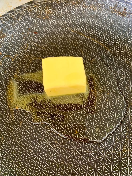 Step 2.1: Melt butter with 2 tbsp oil in a wok over medium-high heat