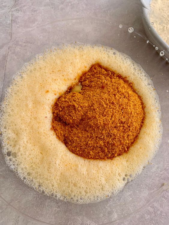 Step 1.2: In a large bowl, beat the eggs until light and frothy