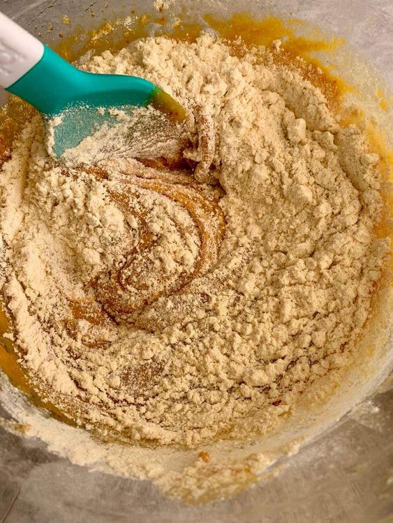 Step 1.1: Add the dry ingredients to the wet mixture in 2–3 batches, alternating with milk