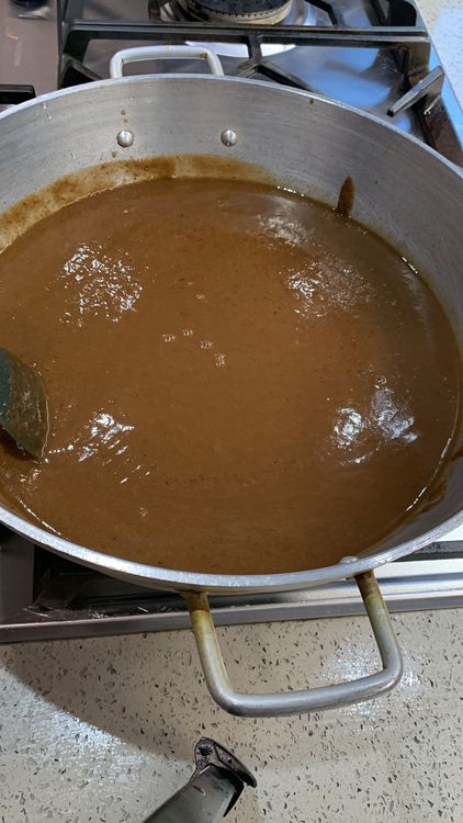 Step 1.1: Pour the tamarind liquid into the saucepan