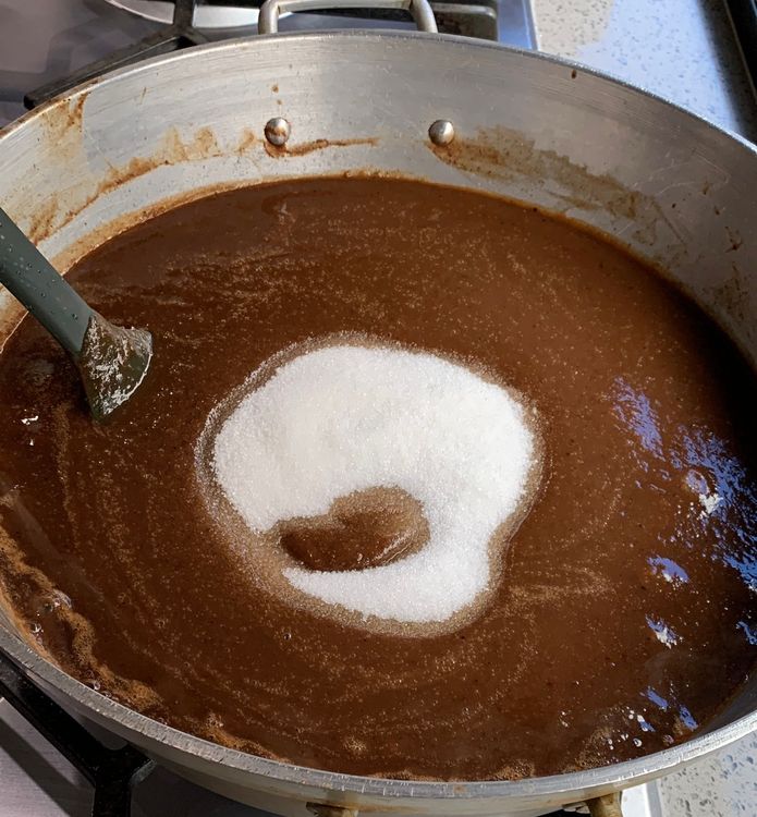 Step 1.1: Add the sugar and jaggery (if using) to the saucepan and stir until it dissolves completely
