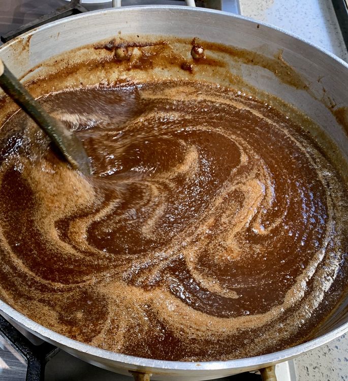 Step 1.3: Add the sugar and jaggery (if using) to the saucepan and stir until it dissolves completely