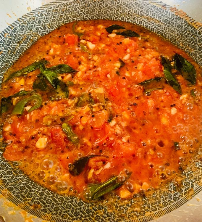 Step 3.2: Add diced tomatoes, stir, and cook for 3-4 minutes