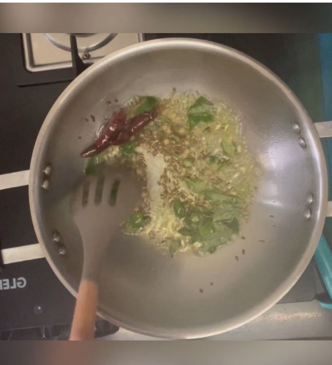 Step 1.1: Add jeera,adrak,green chilli, curry leaves ,red chilli and give it a good mix
