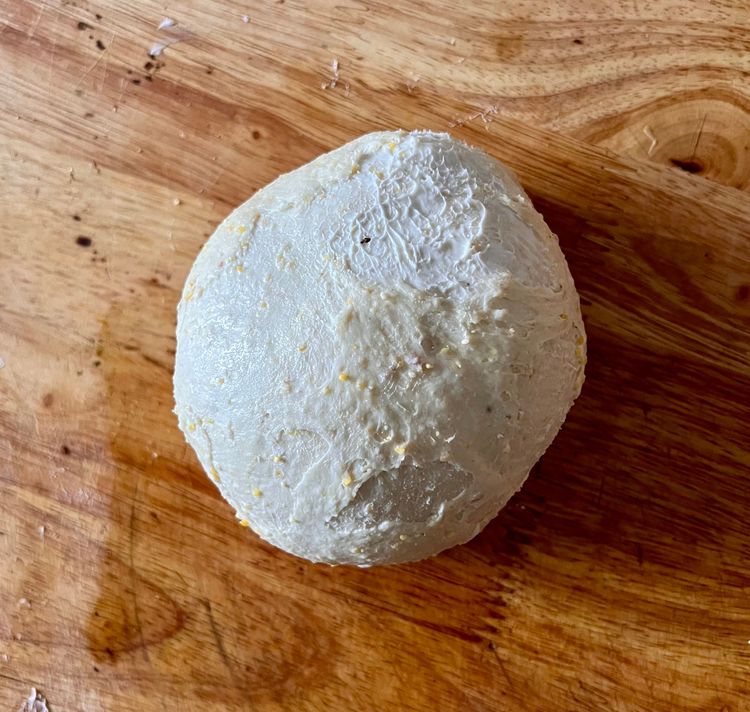Step 1.4: Once you've spread the butter, fold each piece of dough over itself twice, like you would a business letter