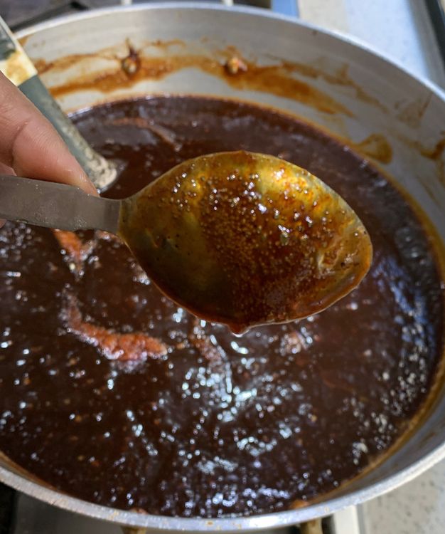Step 1.1: To check the readiness of the tamarind chutney, dip a spoon into the chutney