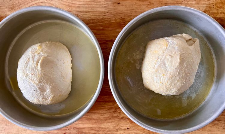Step 1.1: Take out two 9 inch cake pans, put a drop of olive oil in each of them, and with your fingers, spread the oil all over the inside of the pan