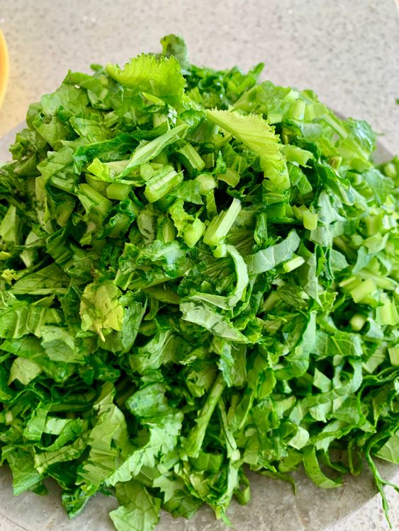 Step 1.1: Remove the thick stems from mustard greens, chop the leaves (and tender stems), wash well, and drain