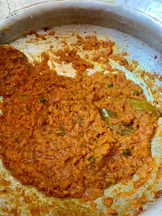 Step 2.2: Mix in turmeric, red chilli powder, coriander powder, salt, and chopped green chillies