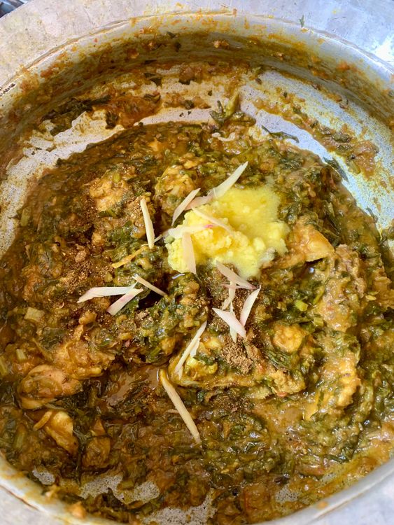 Step 5.1: Stir in garam masala and ghee, then garnish with ginger juliennes
