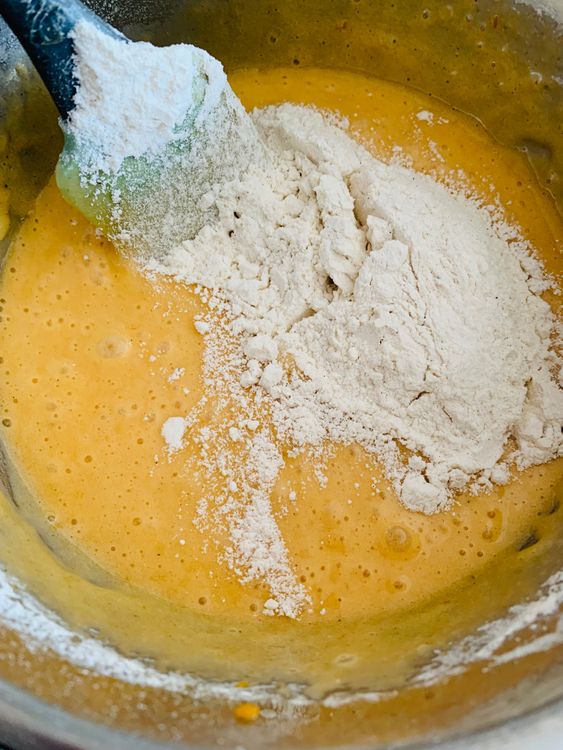 Step 4.1: Gently fold the sifted flour mixture into the wet mixture
