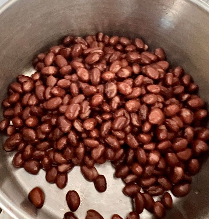 Step 1.1: Briefly heat your black beans in a small sauce pan over medium heat