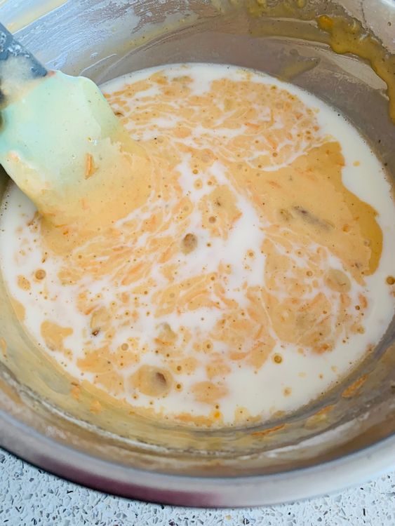 Step 4.1: Pour in the milk and gently mix until the batter comes together