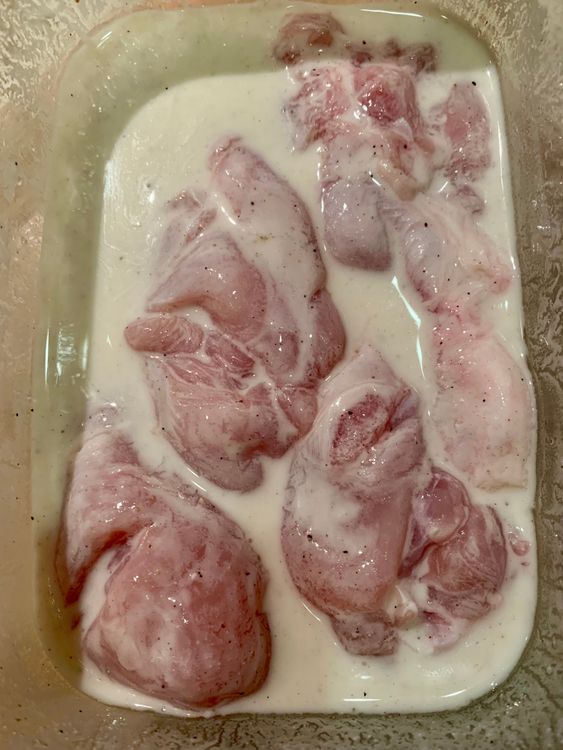 Step 1.1: Make small slits in each chicken drumstick and coat them well