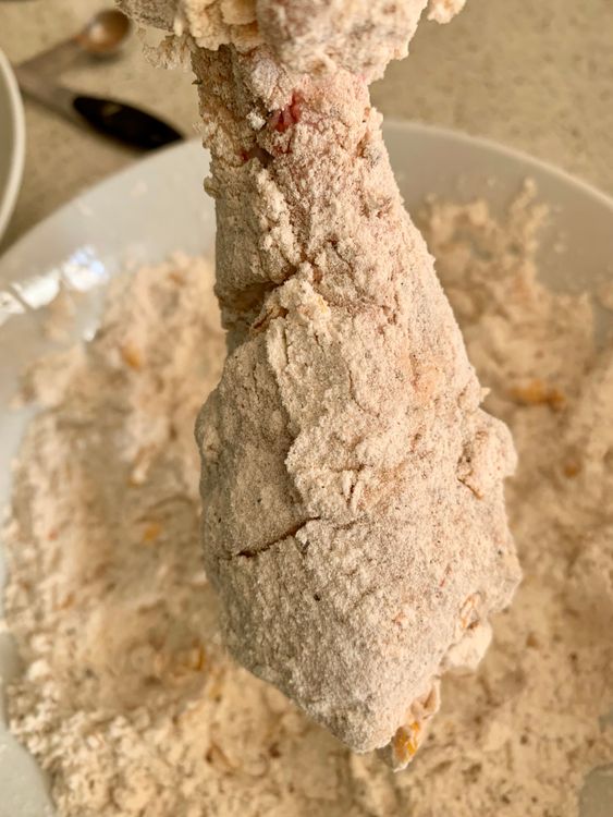 Step 4.1: Dredge each piece in the seasoned flour mix