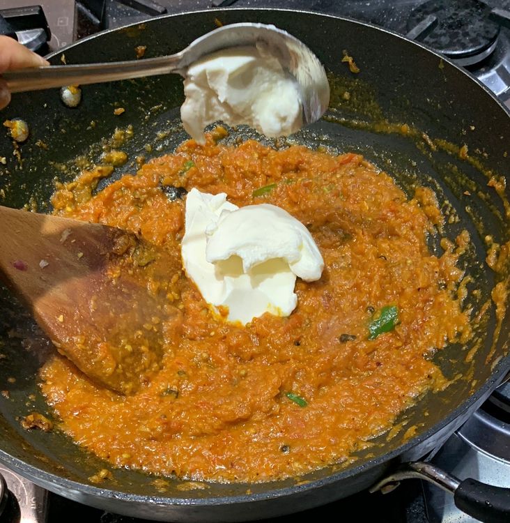 Step 1.1: Add curd, mix well and cook for a few more minutes