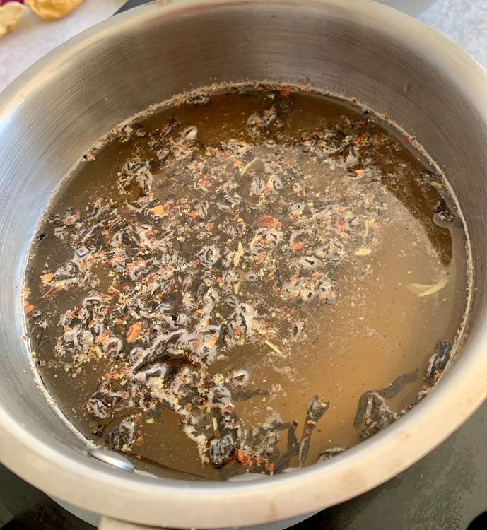 Step 2.1: In a saucepan, mix water with two teaspoons of the tea blend