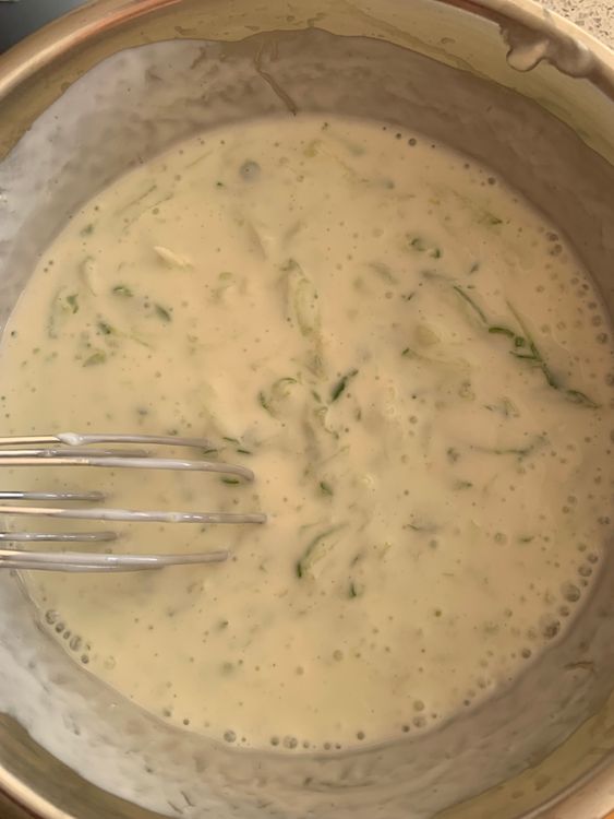 Step 1.1: In a bowl, whisk the yogurt until it becomes smooth