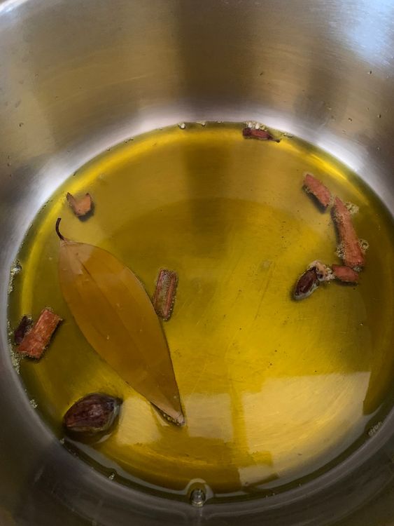 Step 2.1: Heat oil in a pressure cooker