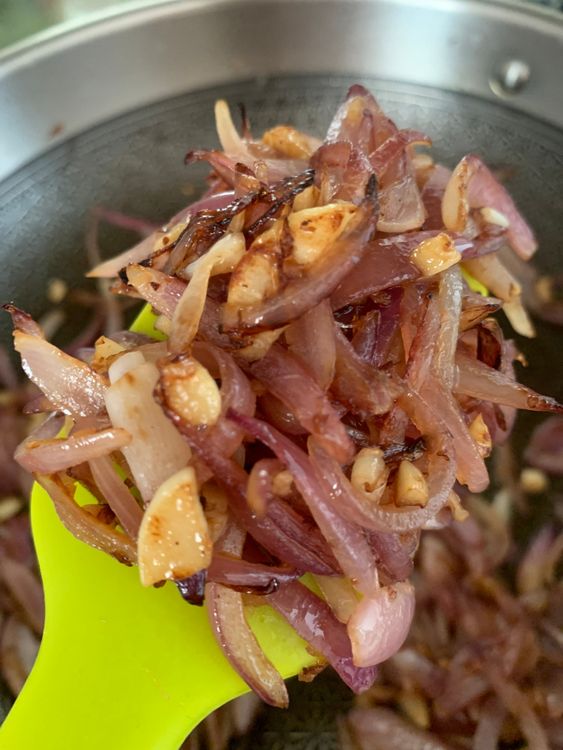 Step 3.1: In the same pan, add oil and fry the onions, garlic, and ginger until slightly browned on high heat