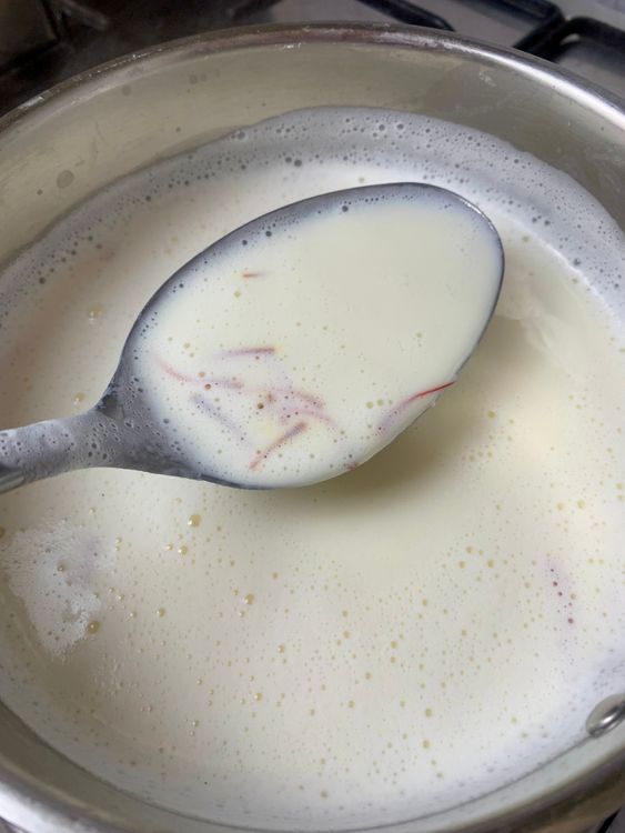 Step 1.1: Pour milk into a deep pot and bring to a boil