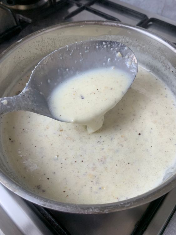 Step 1.2: Add the powdered makhana, stirring continuously to prevent lumps