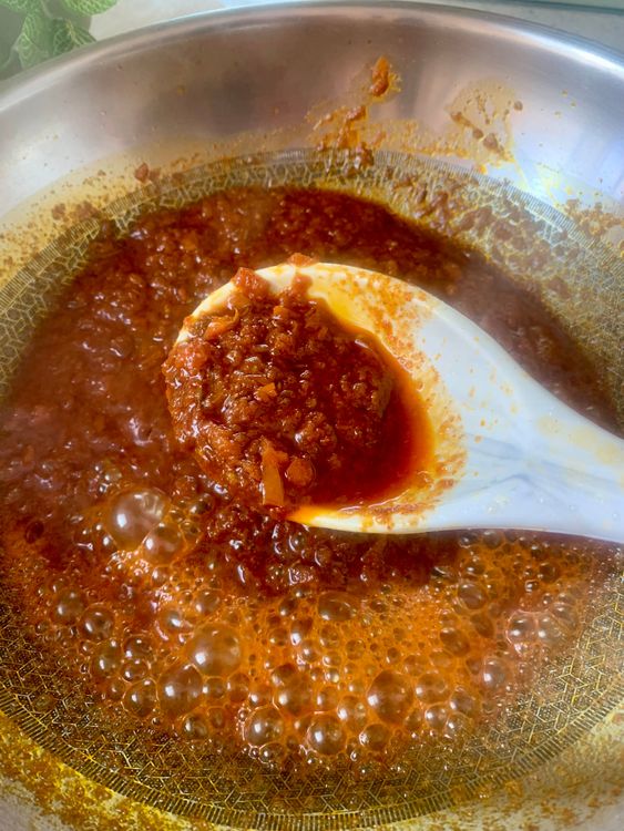 Step 2.1: Add salt and cook until the ghee separates from the masala