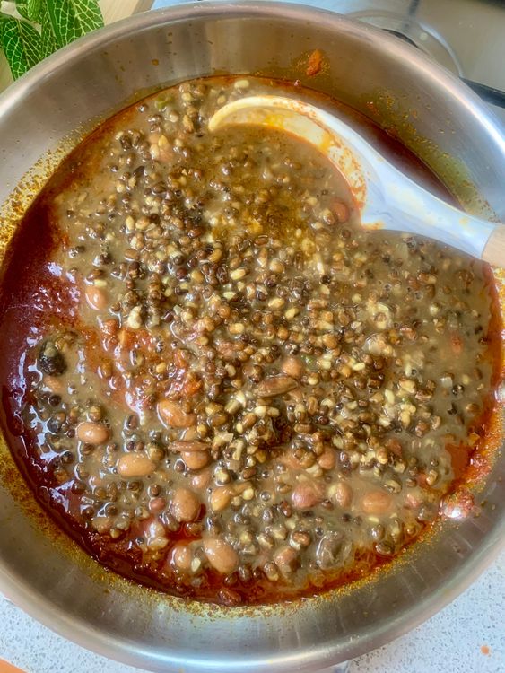 Step 2.1: Add the cooked dal to the pan