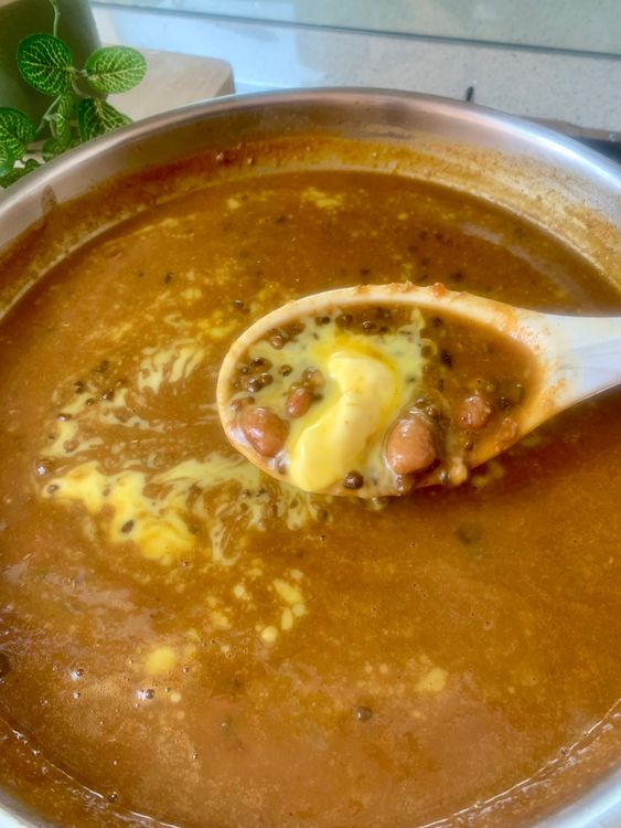 Step 2.1: Mix in butter, kasuri methi, and garam masala