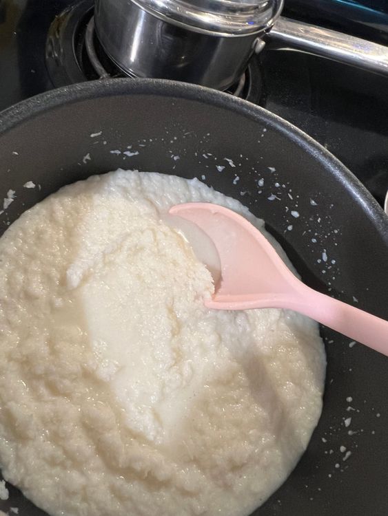 Step 1.1: After cooking with milk, add sugar to the pan and keep stirring continuously on medium flame