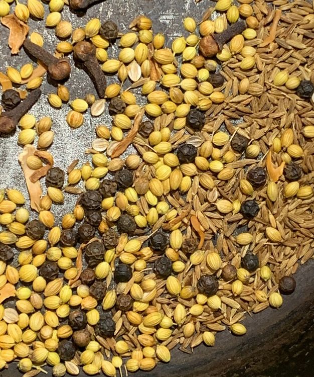 Step 1.1: Turn off the heat and transfer the roasted spices to a plate to cool