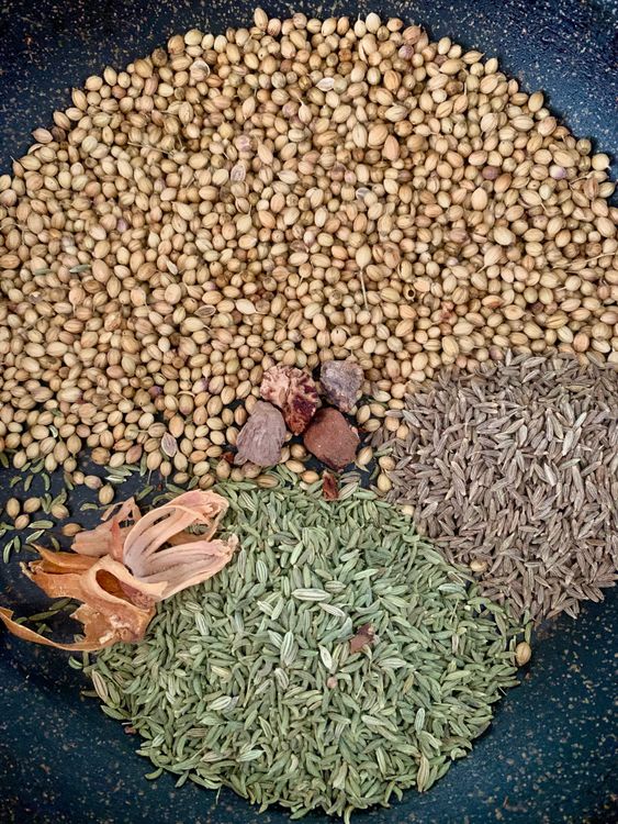 Step 2.1: In the same pan, dry roast coriander, cumin, fennel seeds, mace, and nutmeg for 2–3 minutes until slightly golden and aromatic