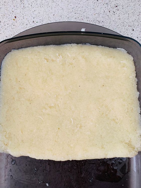 Step 1.1: Transfer the mixture to the greased tray
