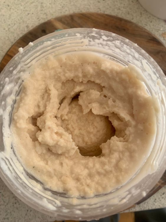 Step 1.1: Drain the urad dal and grind it into a smooth, thick batter with minimal water